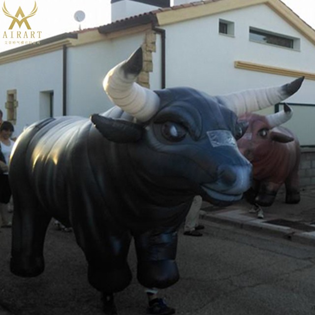 wearing movable inflatable bull costume for parade/event promotion