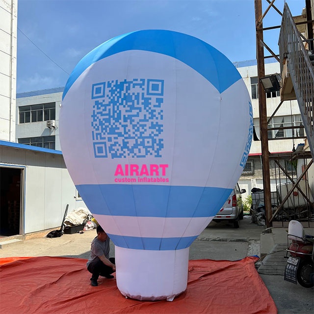 giant inflatable hot air balloon standed on fround for advertising