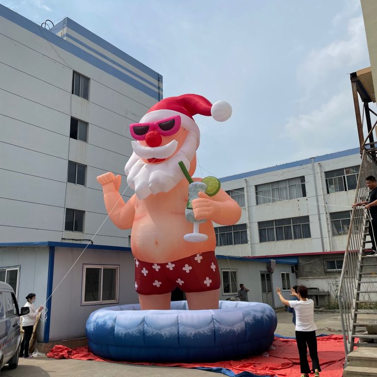 25ft tall inflatable santa in pool (3)