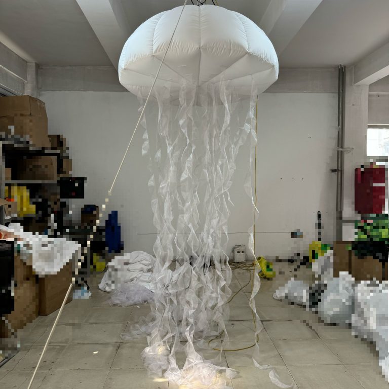 white inflatable jellyfish with lights inside