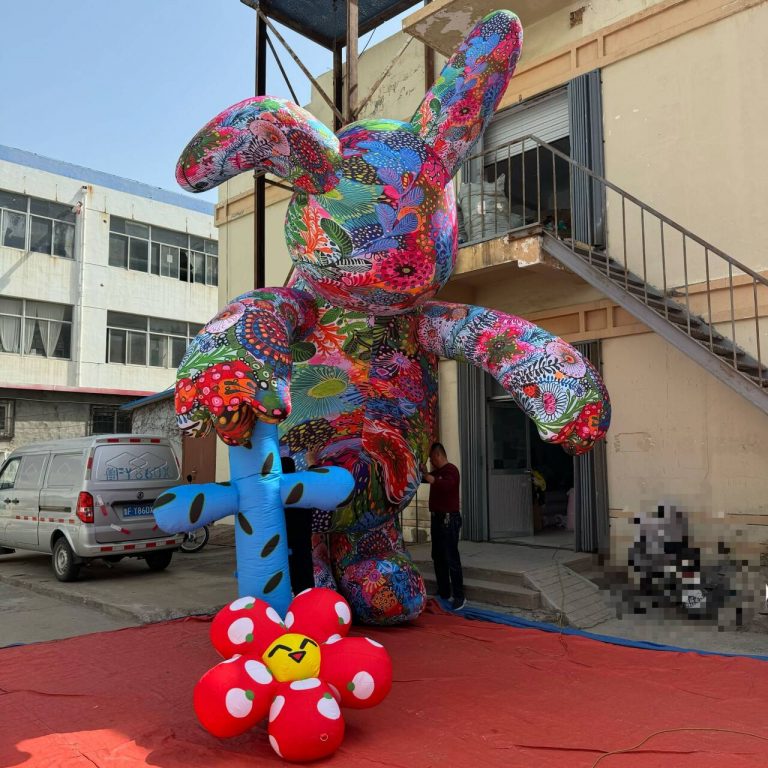colorful inflatable bunny rabbit cartoon with flowers for building decoration